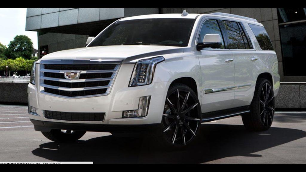 cadillacescaladesuvfromkingstonairporttonegril Jamaica Quest Tours